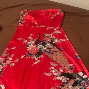 Beautiful red polyester strapless dress.